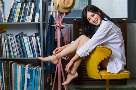 asian model women long hair dark hair barefoot white shirt chair