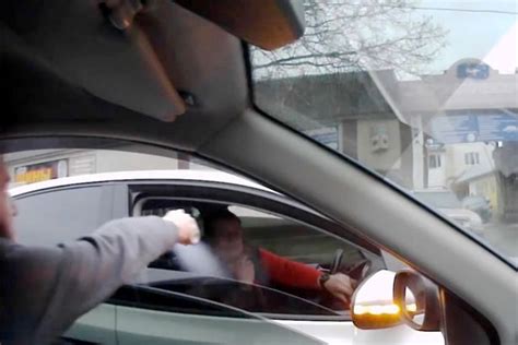 Road Rage Driver Caught On Camera Squirting Pepper Spray In Fellow