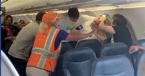 fight breaks out on plane after man refuses to wear face