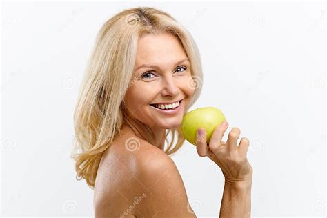 Beautiful Playful Middle Aged Topless Woman Holding Fresh Green Apple
