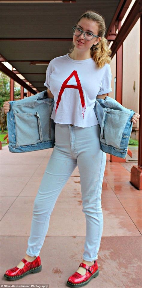 high school girls wear scarlet letters to protest sexist