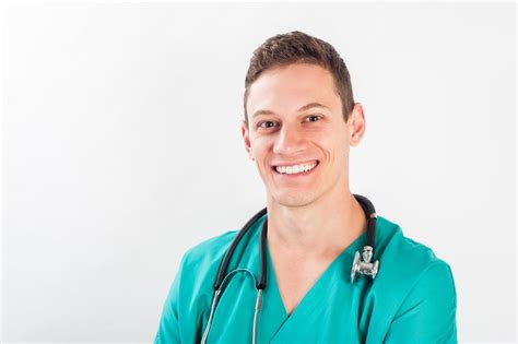 medical portrait male nurse  young man doctor smiling cna classes