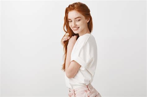 Free Photo Sensual Tender Redhead Girl Looking Behind Coquettish Smiling