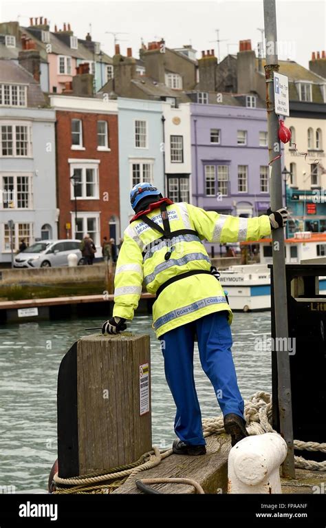 coastguard search weymouth harbour  dorset  missing person stock