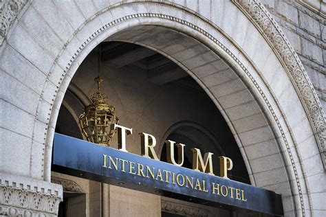 trump hotel   business  video shows signs stripped  building