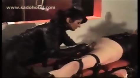 dominatrix burns balls of tied up slave with a cigarette