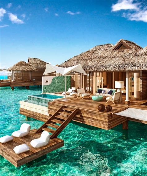 these overwater hotel suites are insane and all inclusive dream