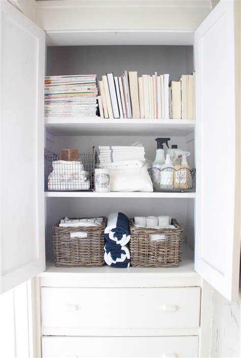 white  linen closet small space storage
