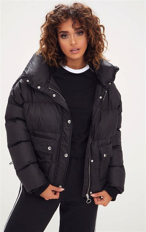 Black Oversized Puffer Jacket With Button Pockets Prettylittlething