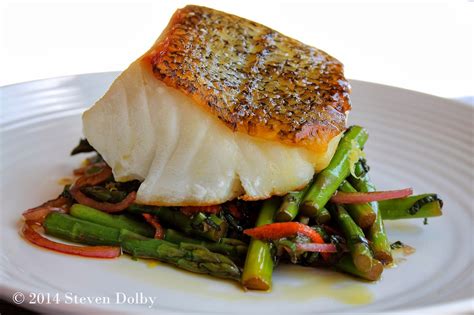 Pan Roasted Sea Bass Served With Asparagus And Mint Salad