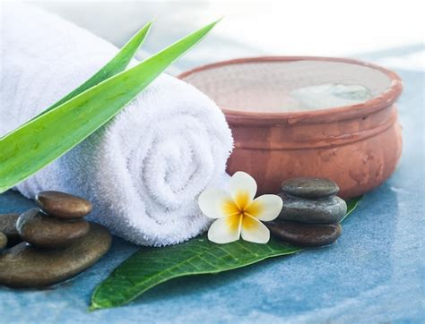 premium photo spa objects  stones  sunlight  massage treatment