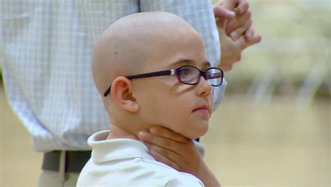 board allows girl who shaved head for friend to return