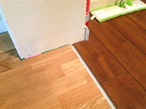 install baseboard   transition  floors
