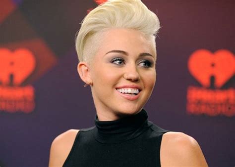 why miley cyrus has been secretly tugging on her hair