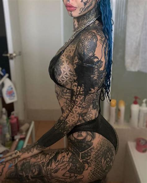 meet the woman who spent £20k on covering her body with tattoos and split her tongue into two