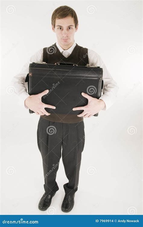 young man carrying briefcase stock photo image   grasping
