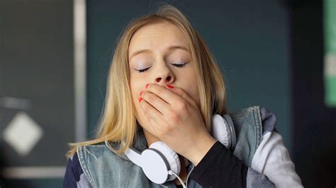 tired girl yawning  falling asleep   restaurant stock video