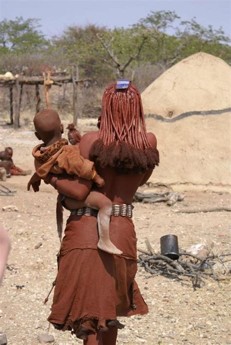himba mother  baby   village  northern namibia erik van de ven afrique faune
