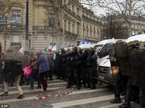 Riot Police Clash With Protesters In Paris As 300 000 Take To The