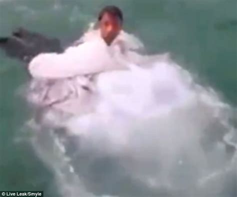 bride almost drowns when trash the dress stunt goes wrong