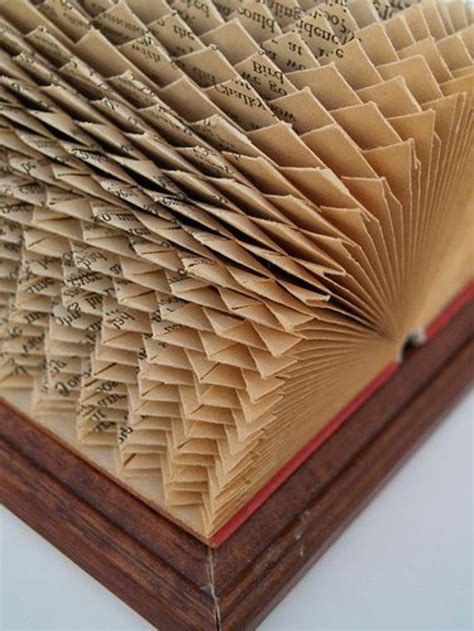 book folding patterns vintage book  red covers   wooden