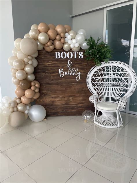 rustic bridal shower backdrop boots bubbly theme   bridal