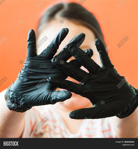 hands black gloves image photo  trial bigstock