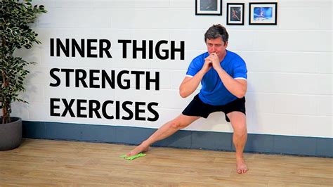 A Man Standing On One Leg In Front Of A Wall With The Words Inner Thigh