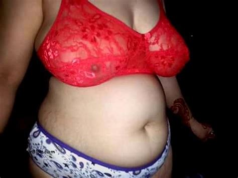 indian milf aunty posing lingerie pieces showing ass curves pics
