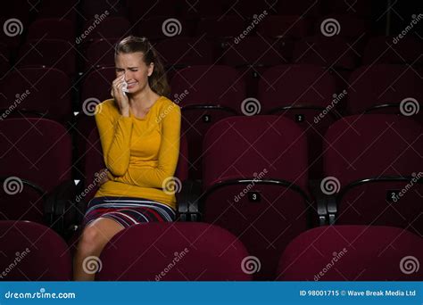 woman crying while watching movie stock image image of premiere seat