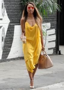 Kat Graham Goes Bra Less In Bright Yellow Frock With Retro Rosy Shades