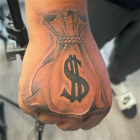 money bag tattoo  hand ideas   blow  mind