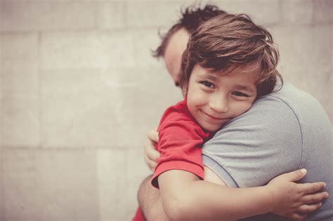 boy hugging  dad morrison child family services