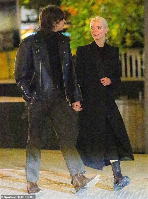 anya taylor joy gets caught in the rain with rumoured husband malcolm