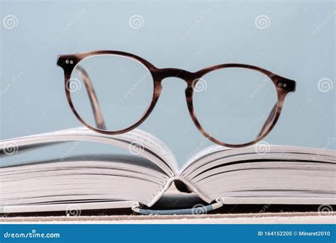 Reading Eyeglasses On Open Book Stock Image Image Of Business
