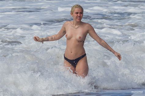 Naked Miley Cyrus In Paparazzi