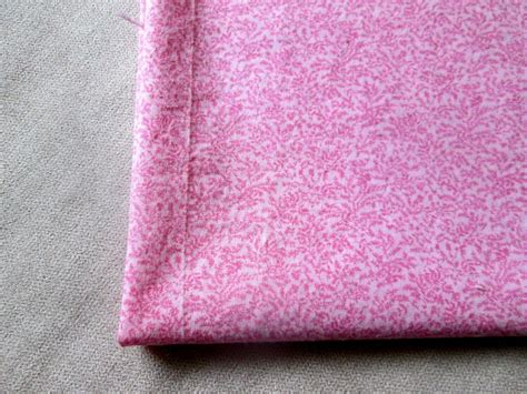 pink floral broadcloth fabric light pink background  dark