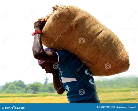 man carrying sack bag editorial stock image image  cloth