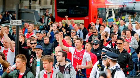 ajax fans descend  london  police monitor high risk tottenham champions league clash