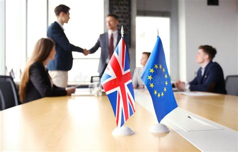 european union  united kingdom leaders shaking hands   deal agreement brexit stock photo