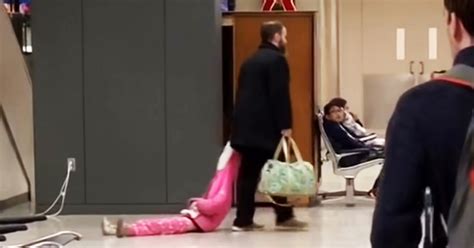 dad drags daughter through airport video goes viral