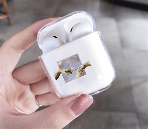 bolcom airpods case hoesje voor apple airpods  en   hand  god airpods hoesje