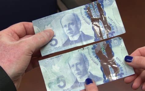 counterfeiters perplexed  canadas plastic money cbc news