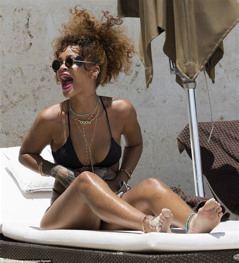 Rihanna Shows Off Her Beach Body In Cut Out Bikini In