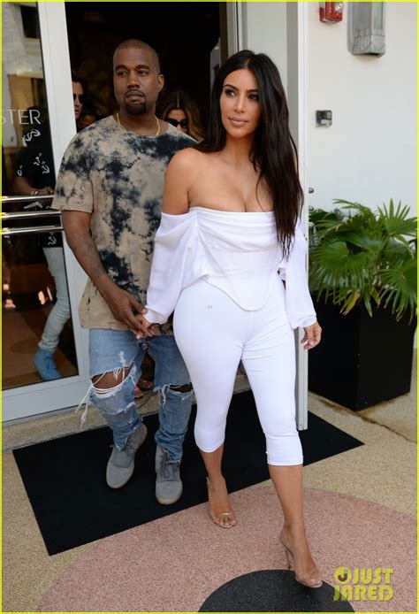 Kim Kardashian Flaunts Curves And Cleavage In White Jumpsuit