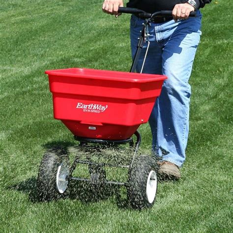 earthway earthway  commercial heavy duty seed  fertilizer broadcast spreader   tow