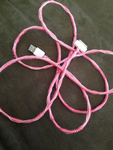 pink cords connected      black surface   white cord   middle