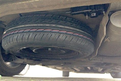 places    store spare tyre   vehicle roadniche spare tyre