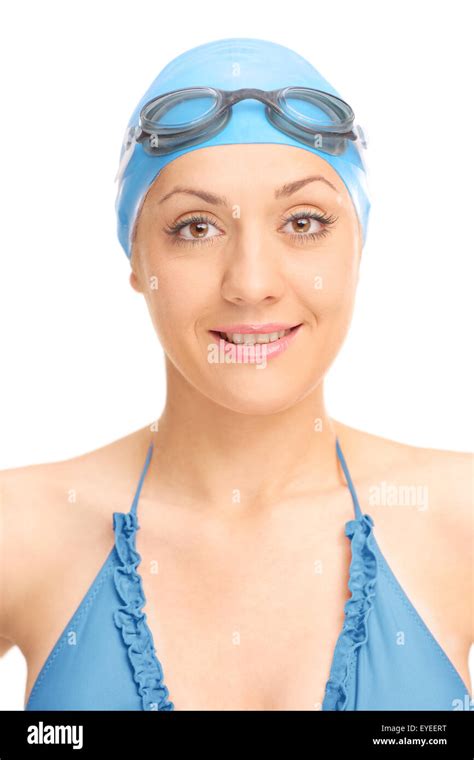 Vertical Shot Of A Female Swimmer With Black Swimming Goggles And Blue