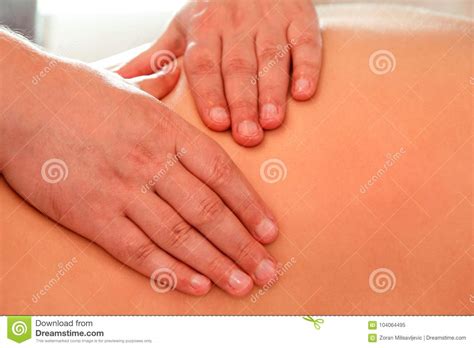 Close Up Detail Of Hands Massaging Female Shoulder And Back Stock Image